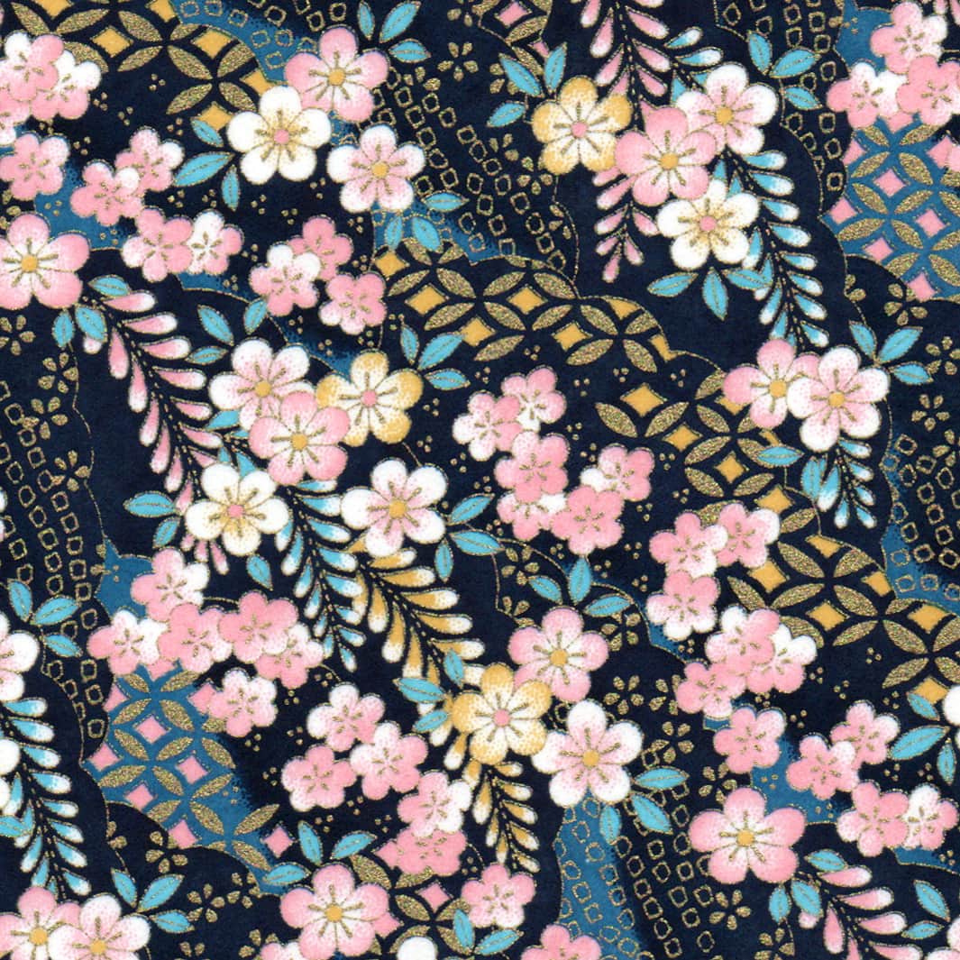 carré de 10cm par 10cm de papier japonais yuzen chiyogami aux motifs de fleurs de prunier et nuages à motifs bleu marine et turquoise, jaunes, roses, blancs et dorés adeline klam (M1032)