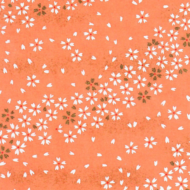 carré de 10cm par 10cm de papier japonais yuzen chiyogami aux motifs de fleurs au vent dans les tons orange saumon adeline klam (M865)