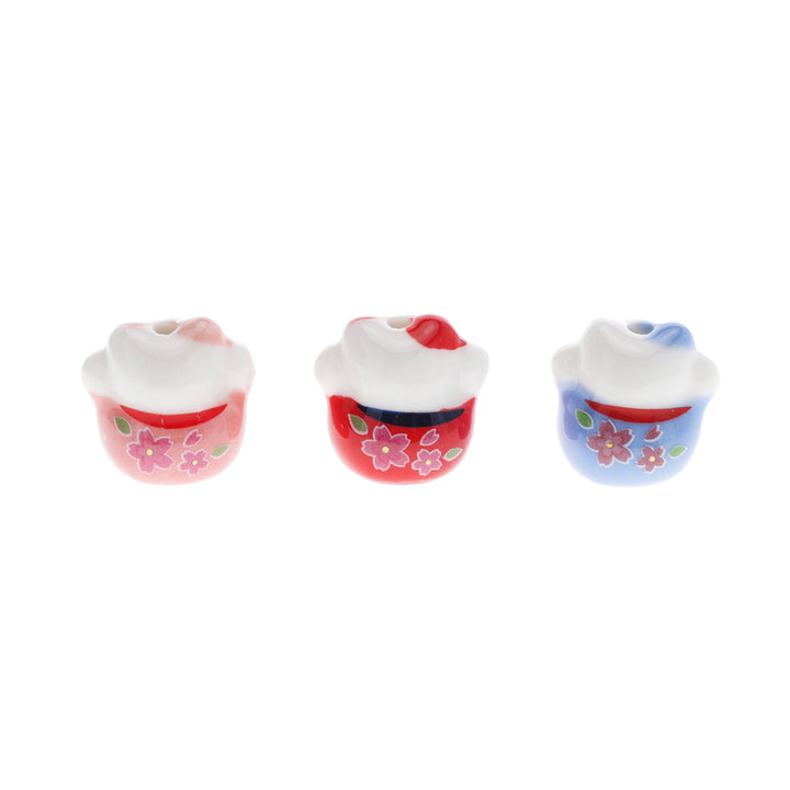 photo de dos de perles en céramique en forme de grand maneki-neko