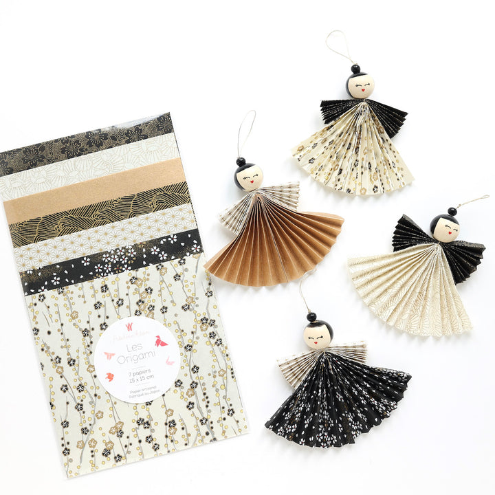 photo d'ambiance du lot de fil et de perles « poupées kokeshi » noires adeline klam