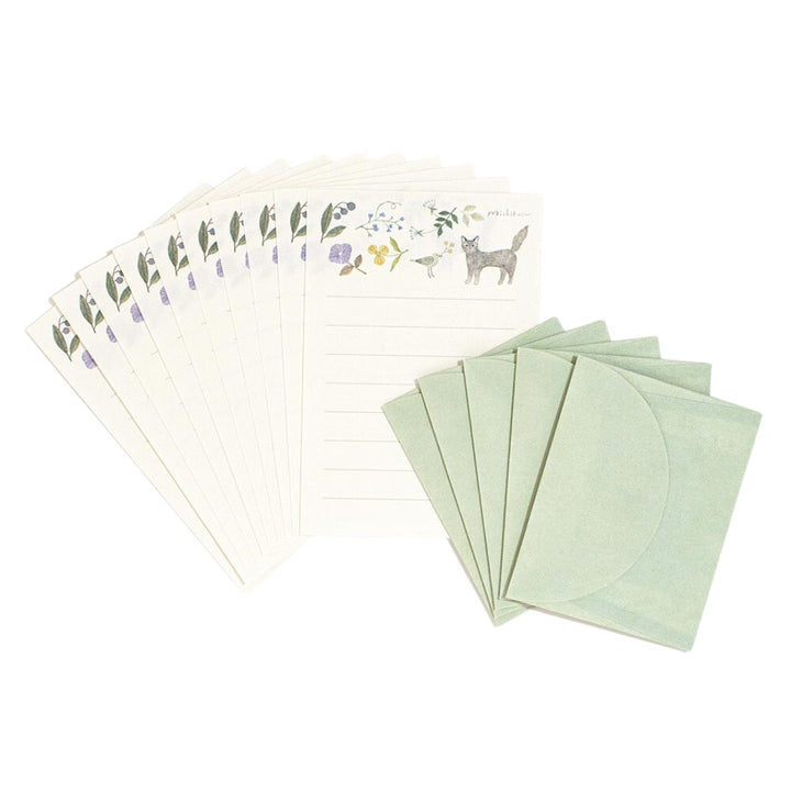 photo packshot de l'assortiment d'enveloppes et de papier à lettres du mini set de 10 papiers à lettre et 5 enveloppes verts aux motifs de chat, d'oiseau et de fleurs de nb bo., ltd. japan
