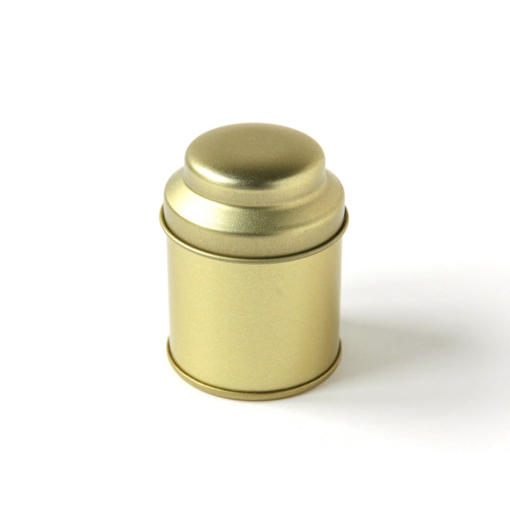 photo packshot d'une boîte à thé dôme fermée doré de 25g