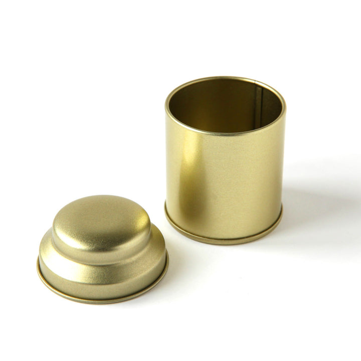 photo packshot d'une boîte à thé dôme ouverte doré de 25g