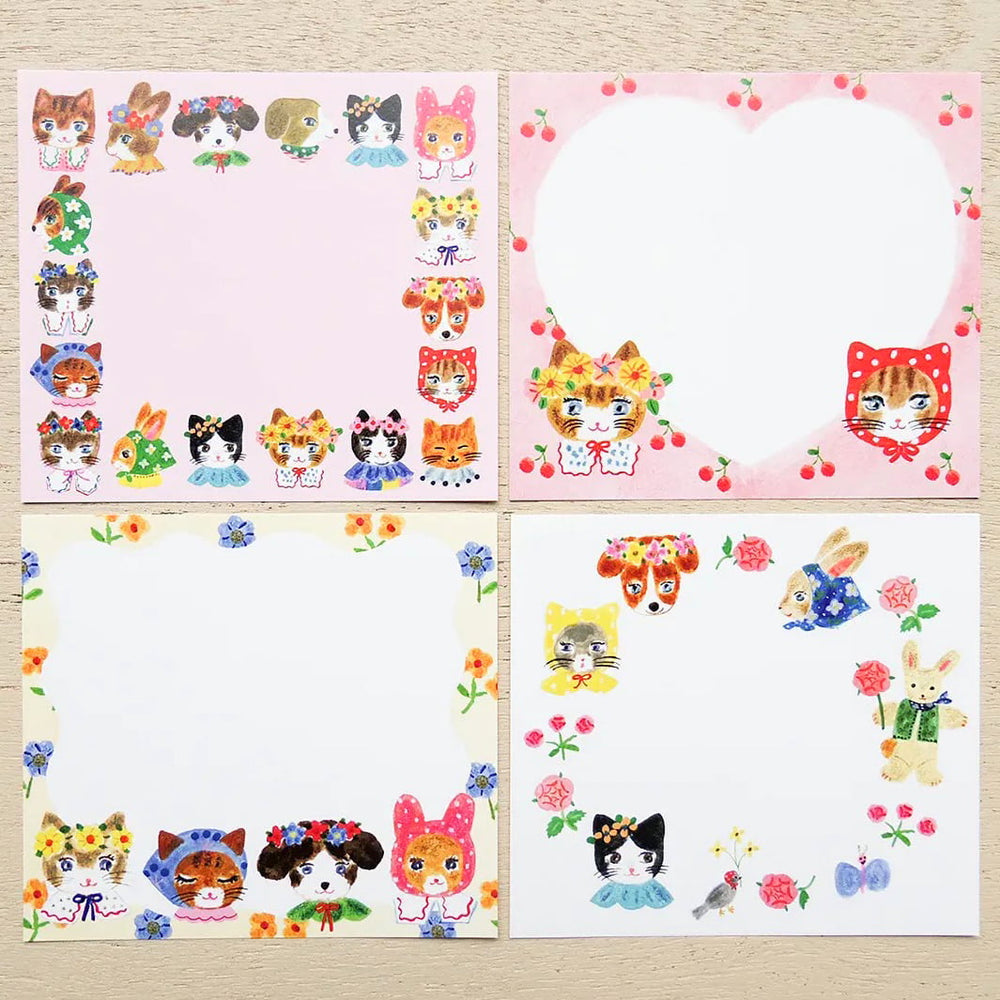 photo packshot du détail des 4 motifs du bloc-notes de 120 feuilles « niko niko smile » par Aiko Fukawa pour Cozyca Products