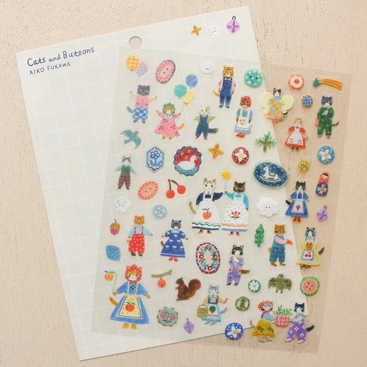 photo packshot d'un détail du packaging de la planche de 55 stickers « cats and buttons » de aiko fukawa pour cozyca products