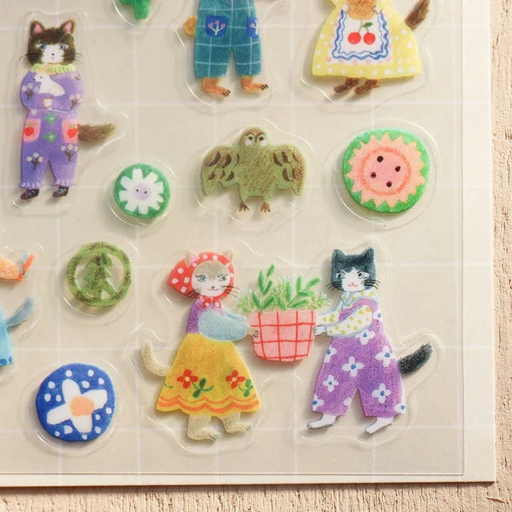 photo packshot d'un détail des stickers de la planche de 55 stickers « cats and buttons » de aiko fukawa pour cozyca products