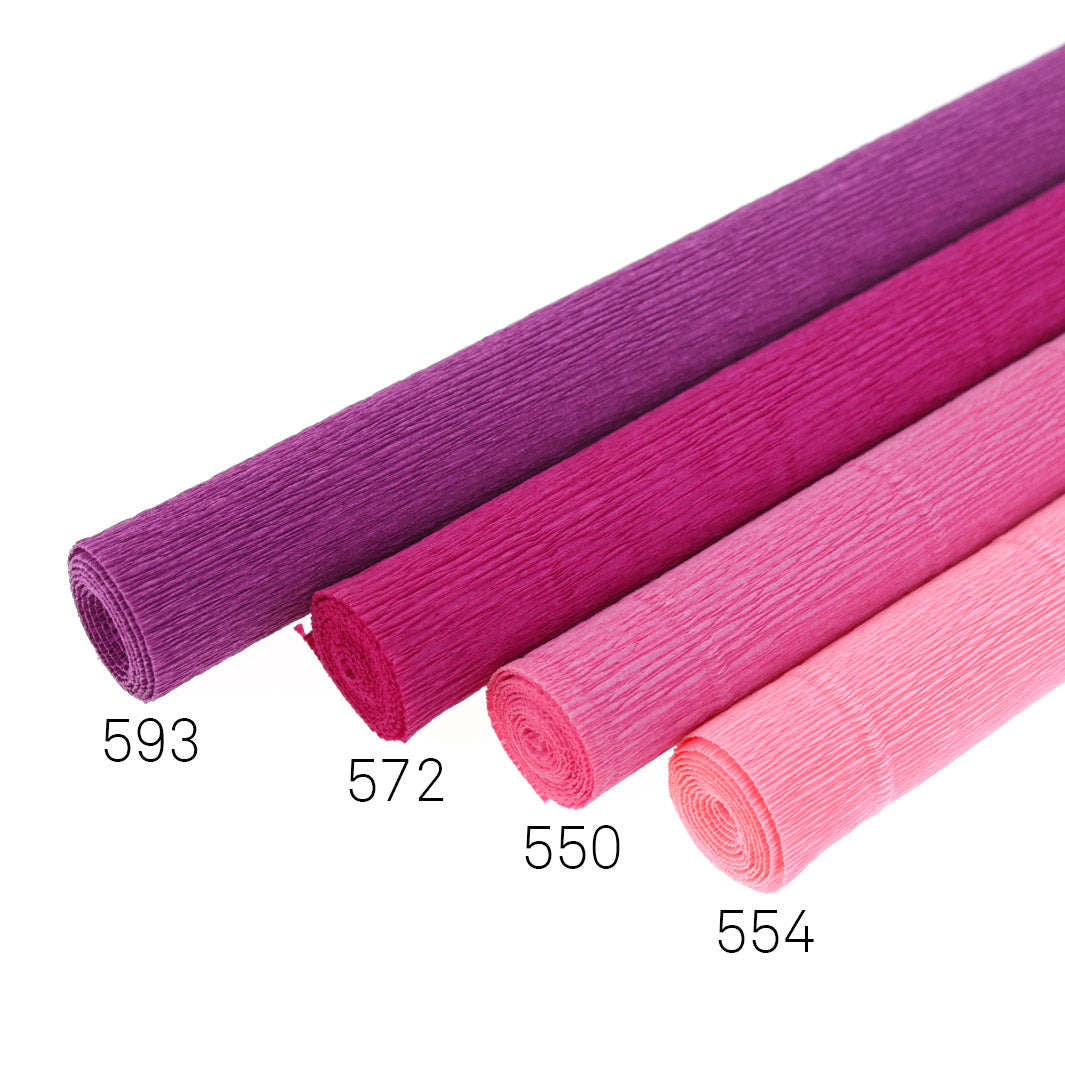 photo packshot de 4 rouleaux de 50cm par 60cm de papiers crépon épais 180g dans différents tons de roses et de violets chauds (593, 572, 550 et 554)