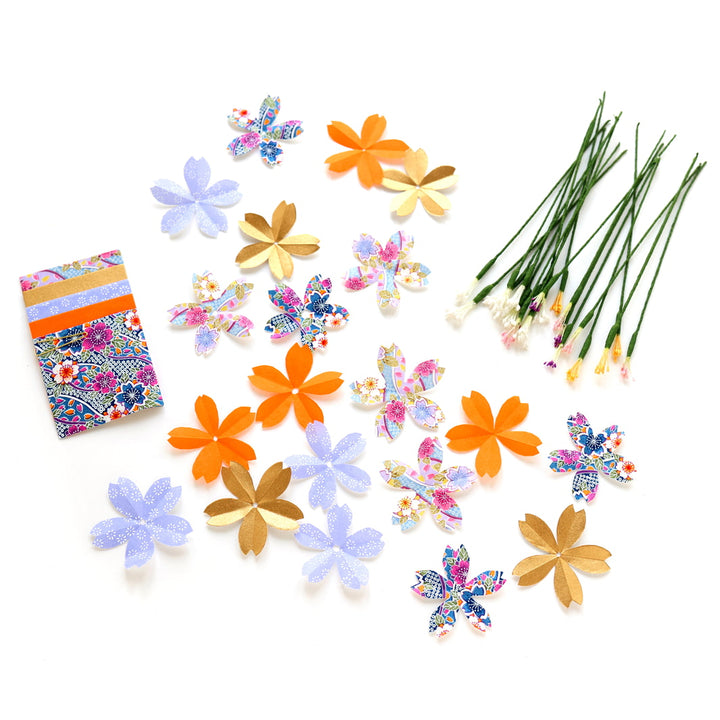 photo packshot des fleurs fabriquées du kit bouquet de fleurs de cerisier dans les tons violet lilas, dorés et orange fluo « baya » adeline klam