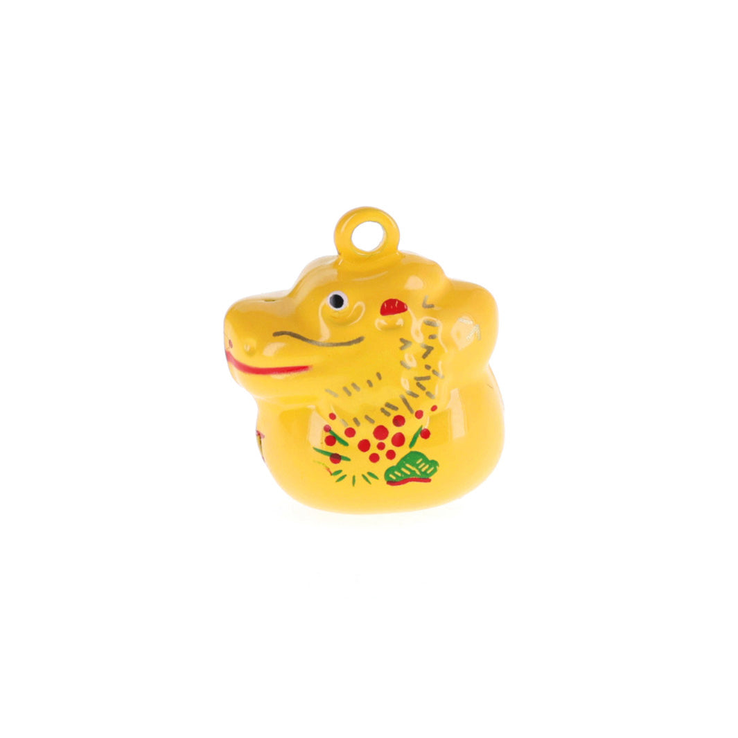 photo packshot d'un petit grelot en forme de dragon jaune