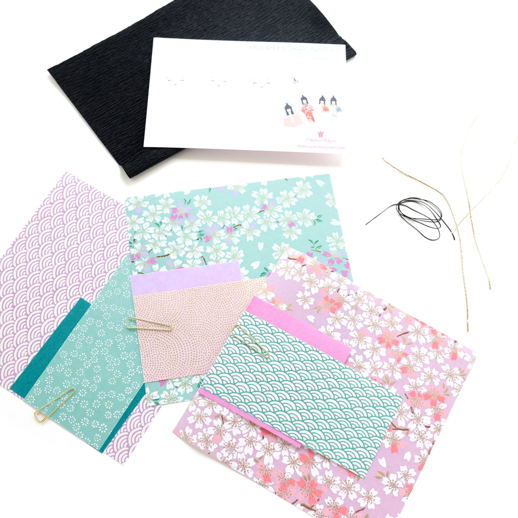 photo packshot du matériel du kit poupées japonaises « lilas » dans les tons vert d'eau, roses et violet mauve adeline klam