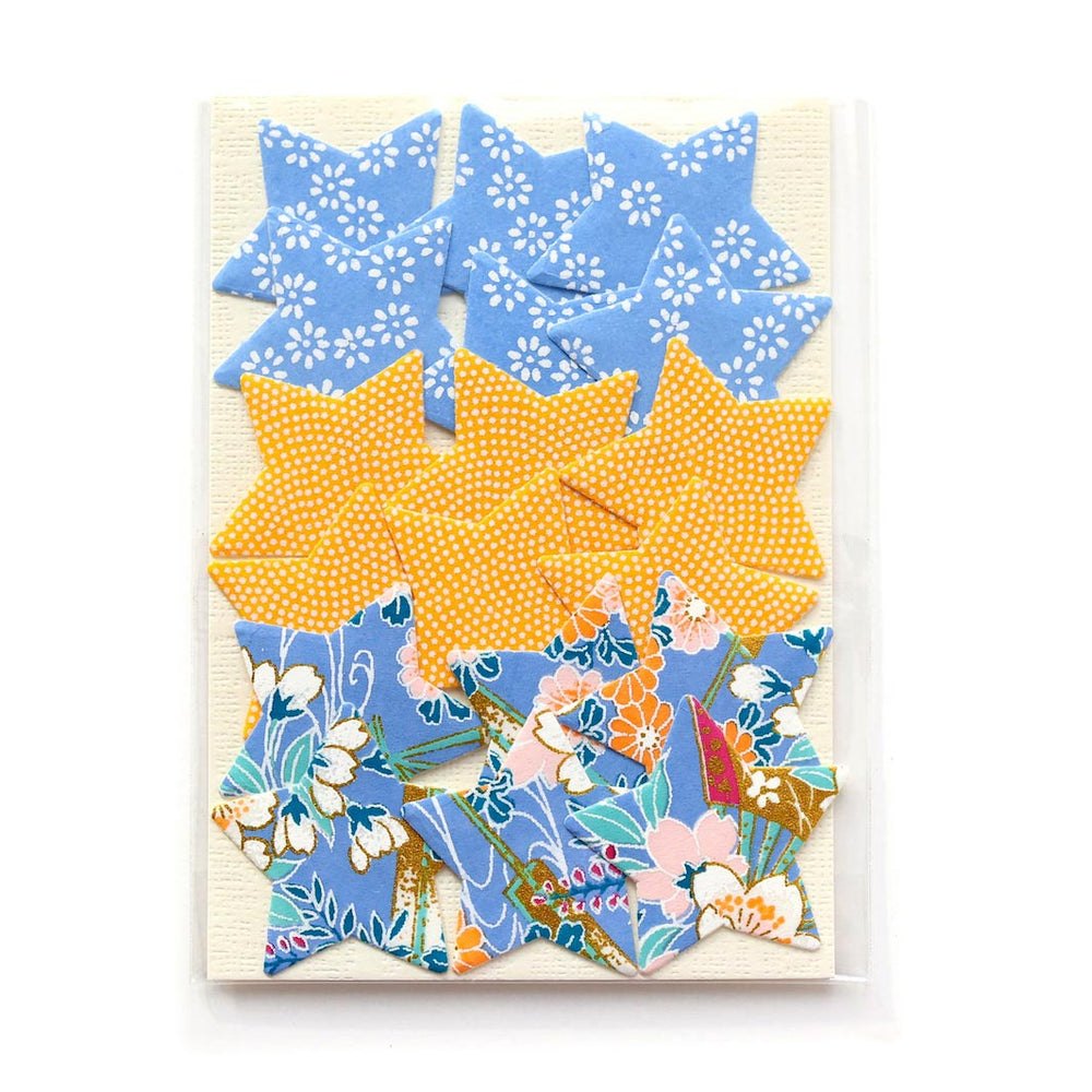 photo packshot du packaging lot de 18 stickers étoile en papier japonais adeline klam dans les tons bleu pervenche et jaune safran « comète »