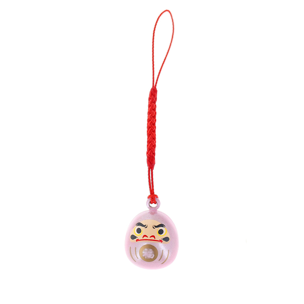photo packshot d'un porte-clefs en forme de daruma de couleur rose clair nacré