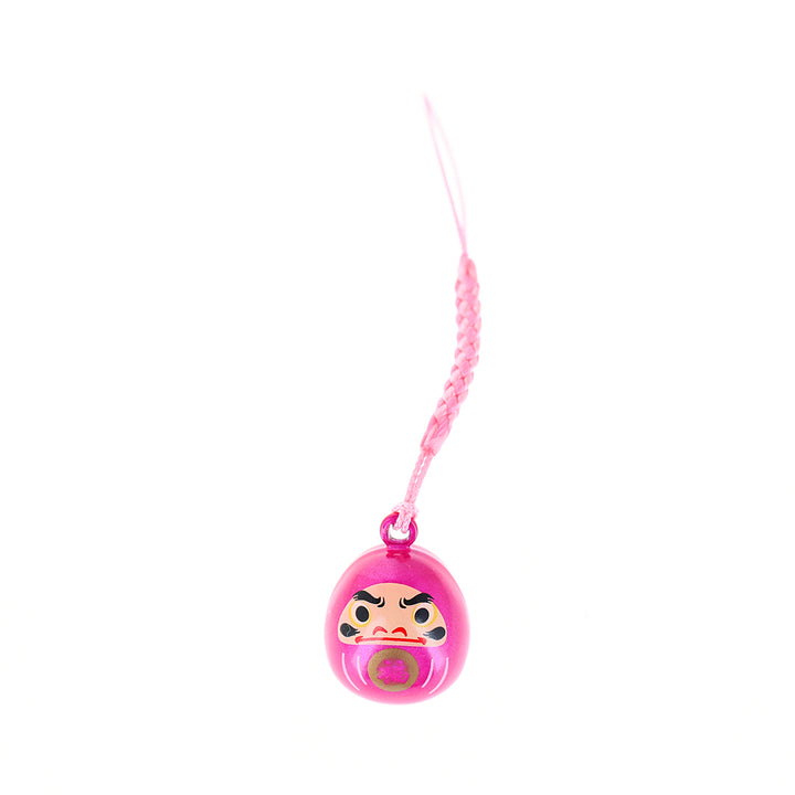 photo packshot d'un porte-clefs en forme de daruma de couleur rose fuchsia nacré