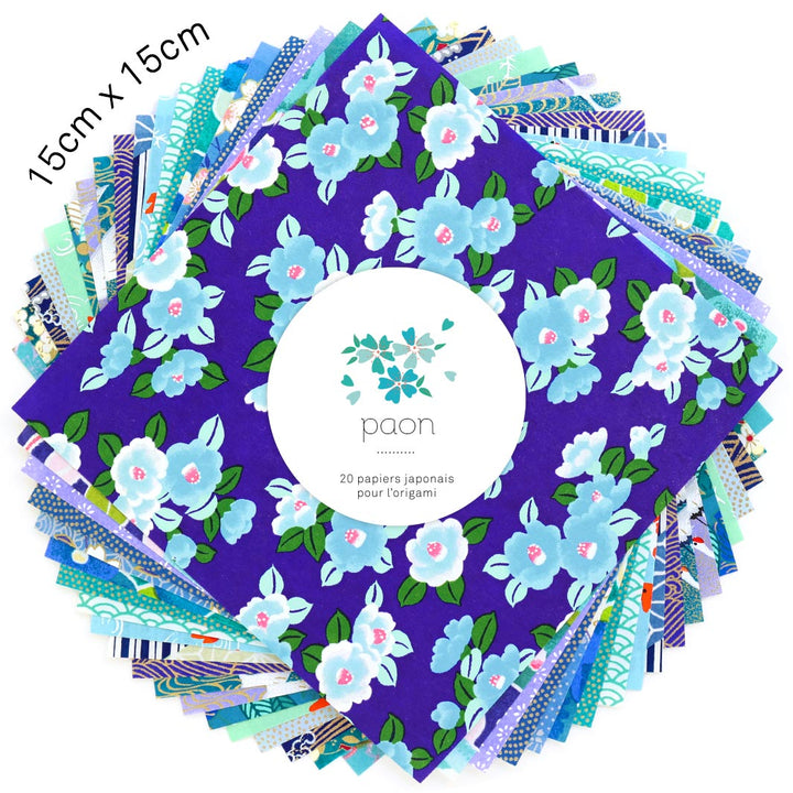 photo packshot du set de 20 carrés de papiers japonais adeline klam de 15cm par 15cm dans les tons bleu canard, vert d'eau, bleu nuit, turquoise et violets « paon »