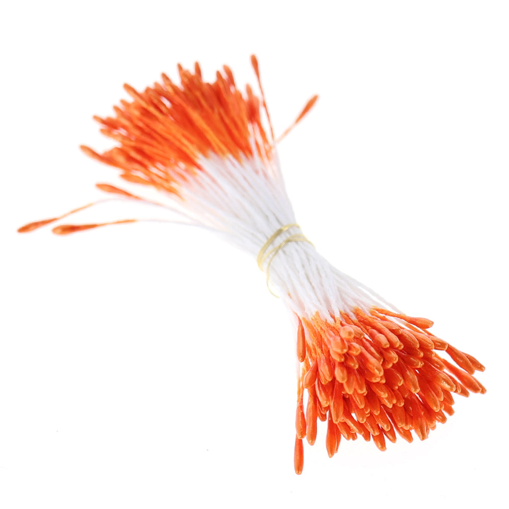 photo packshot vue de biais du fagot de pistils de fleurs métallisés orange et blancs (1081)