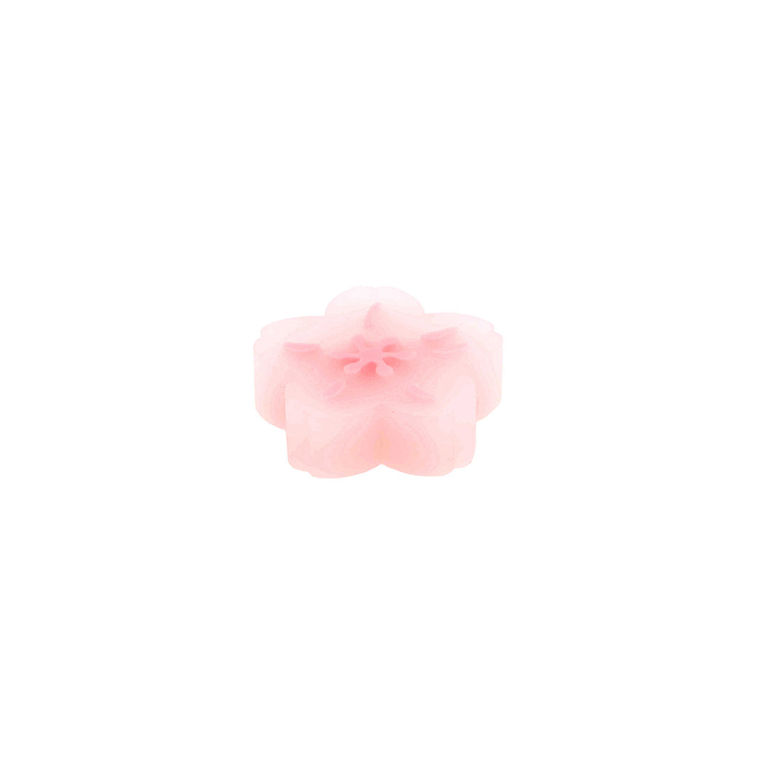 photo packshot d'une vue de l'épaisseur de la gomme fleur de cerisier rose clair rico design