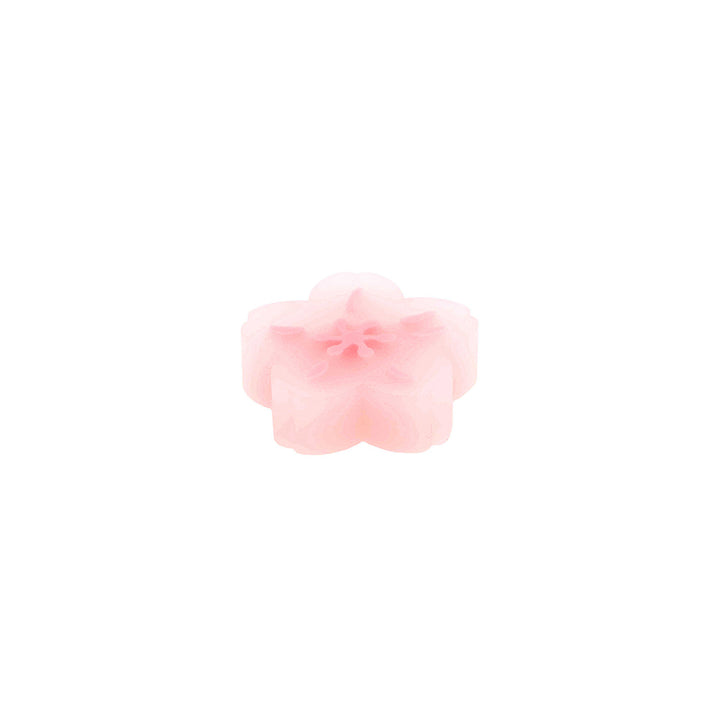 photo packshot d'une vue de l'épaisseur de la gomme fleur de cerisier rose clair rico design