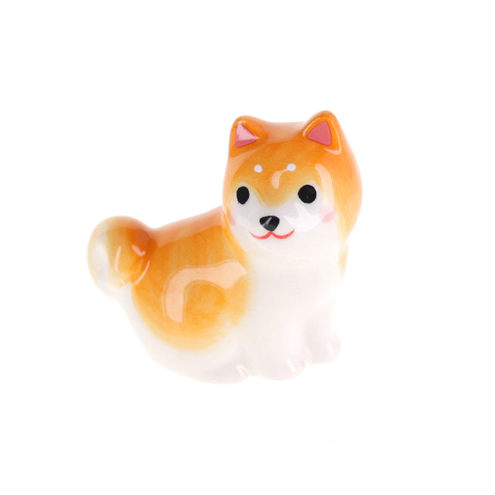 photo packshot vue de face du porte baguette en forme de shiba inu assis de couleur orange