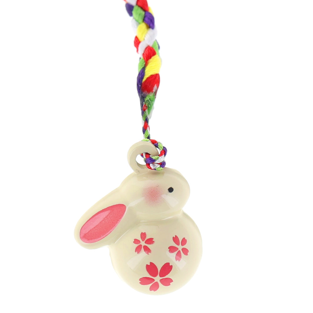 photo packshot zoomée d'un porte-clefs en forme de lapin de couleur jaune et rose