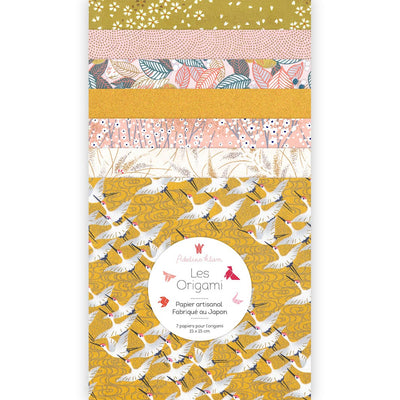 pochette de 7 carrés de papiers japonais adeline klam de 15cm par 15cm dans les tons jaune moutarde, rose clair et blanc « savane »