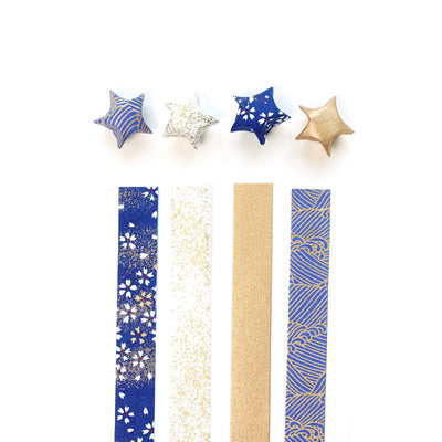 kit d'étoiles en origami et papier japonais bleu nuit, violet et doré « douce nuit » adeline klam posé à plat droit
