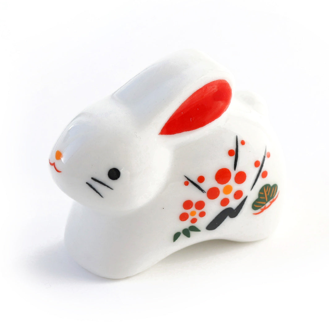 figurine de lapin blanc debout en céramique vue de côté