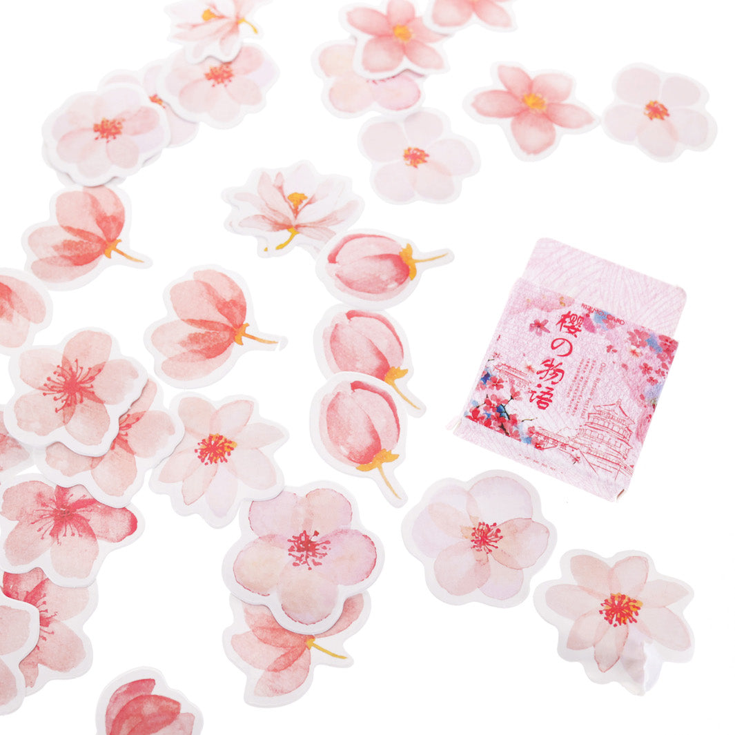 zoom d'un lot de 45 stickers en forme de fleurs de cerisier dans les tons roses et corail
