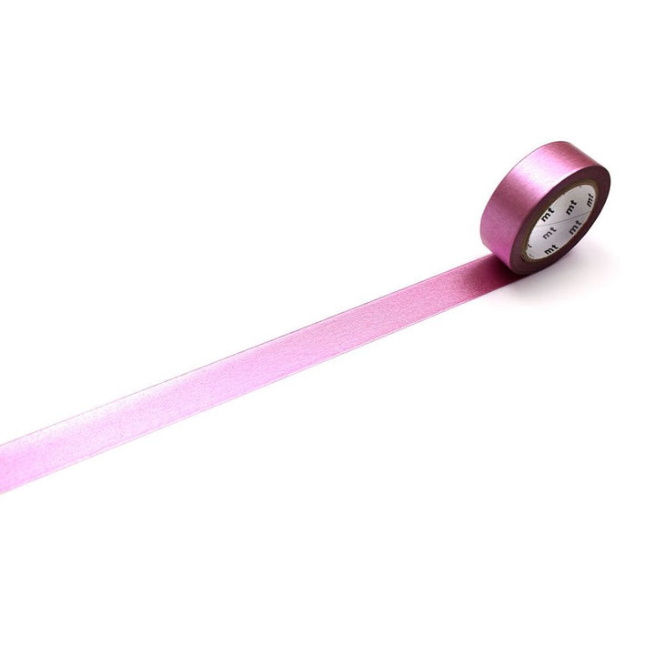 photo d'un masking tape uni métallisé de couleur rose déroulé